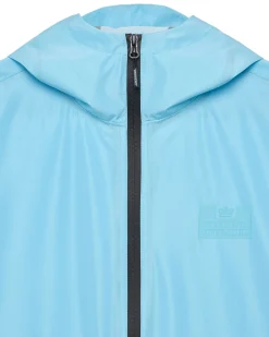 Football + Festivals Wasserdichte Pack-Away-Jacke Ocean Wave Blue